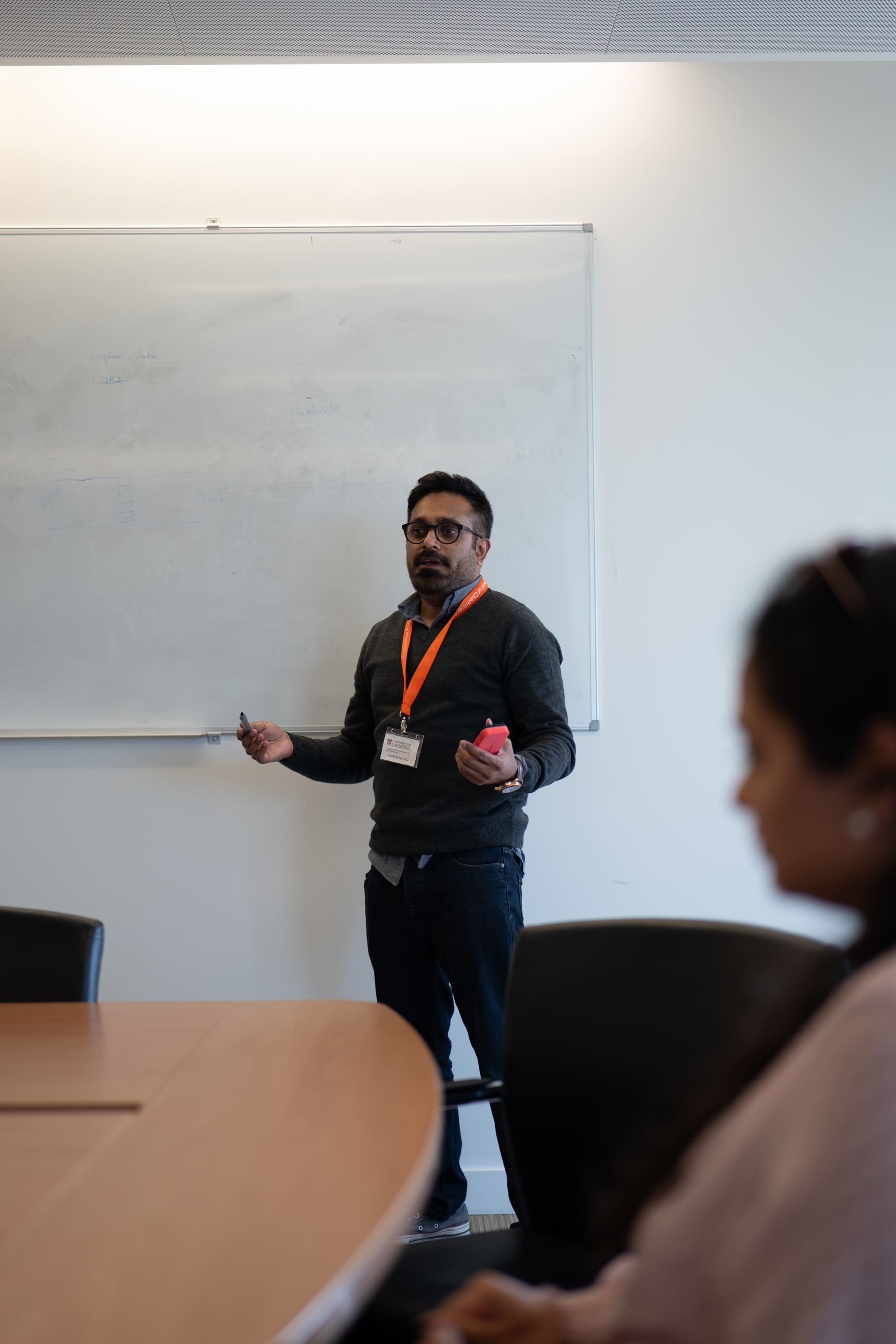 Diverse presenter delivering impactful presentation demonstrating thought leadership